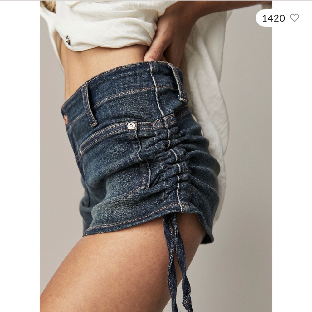 Free People Blue Jean booty Shorts with tie on each side to tighten